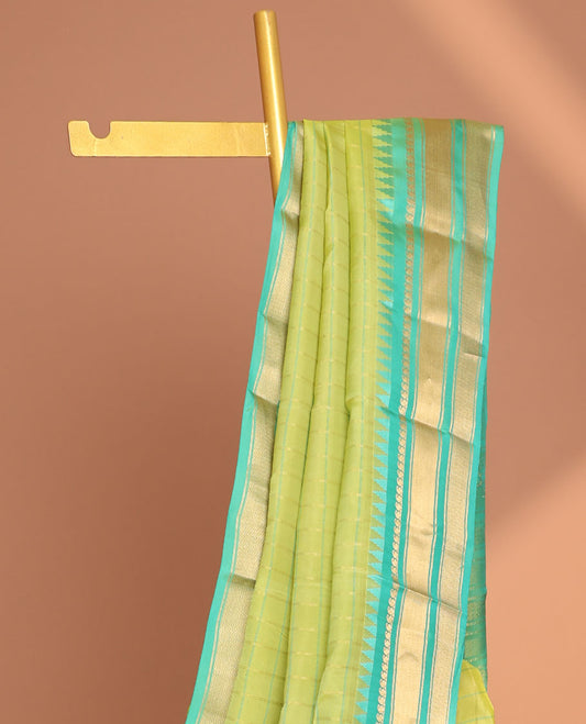 Green striped vasundhara elite silk saree with contrast zari design border & striped pallu