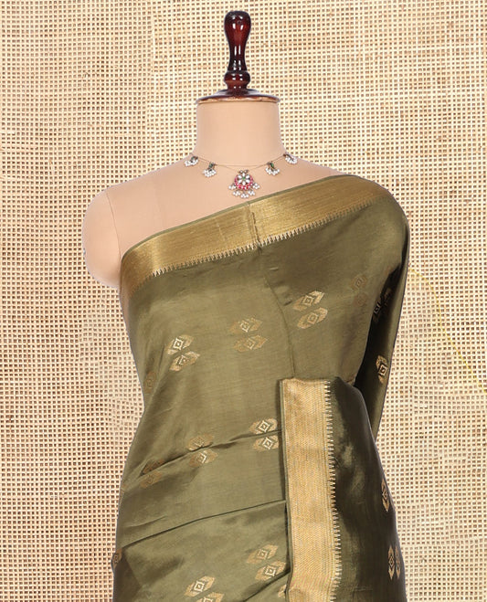 Green Banana Pith Saree, Decorated with Buttas, a Zari Temple Border, Striped Pallu, and Matching Blouse