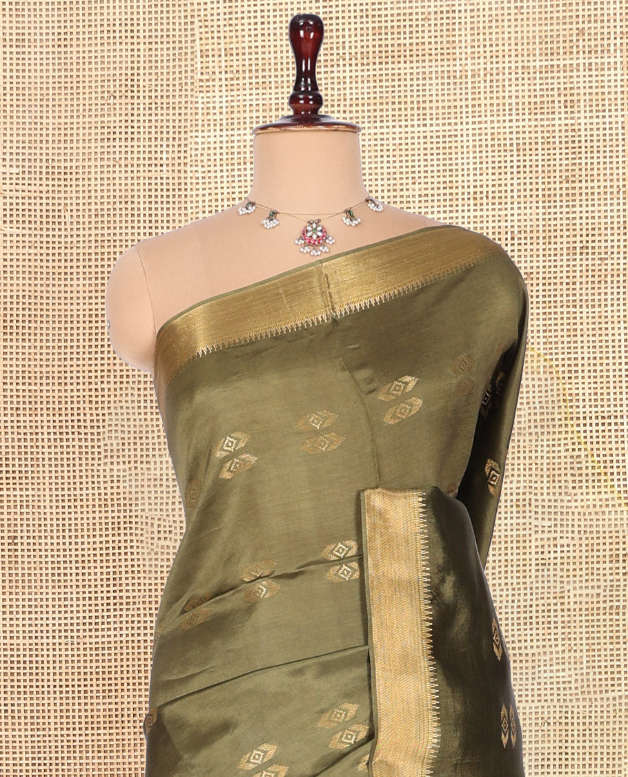 Green Banana Pith Saree, Decorated with Buttas, a Zari Temple Border, Striped Pallu, and Matching Blouse