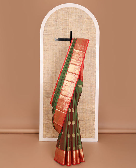 Green zari buttas Vasundhara elite silksaree, contrast zari border of rekku,muthu,floral & paisleys & jaal pallu