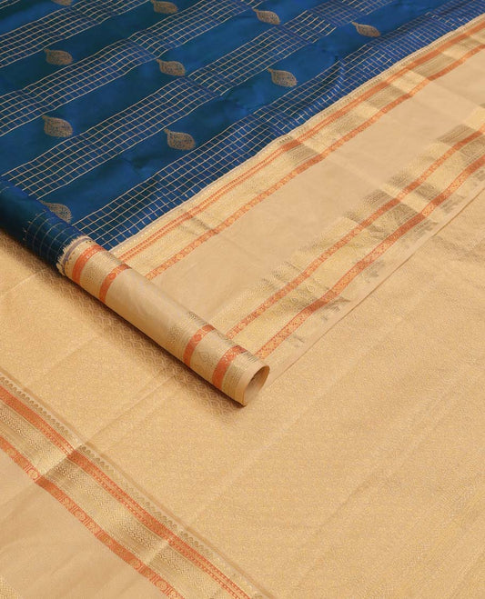 Blue zari buttas and zari checked Vasundhara silk mix saree, contrast border of thilakam, muthu, banaras, poun, and mayil designs, and then kuli kann pallu