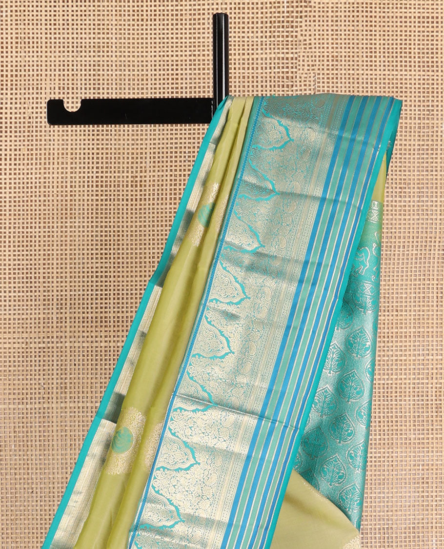 Light green floral buttas vasundhara elite silk saree with contrast intricate zari design border & floral zari design pallu