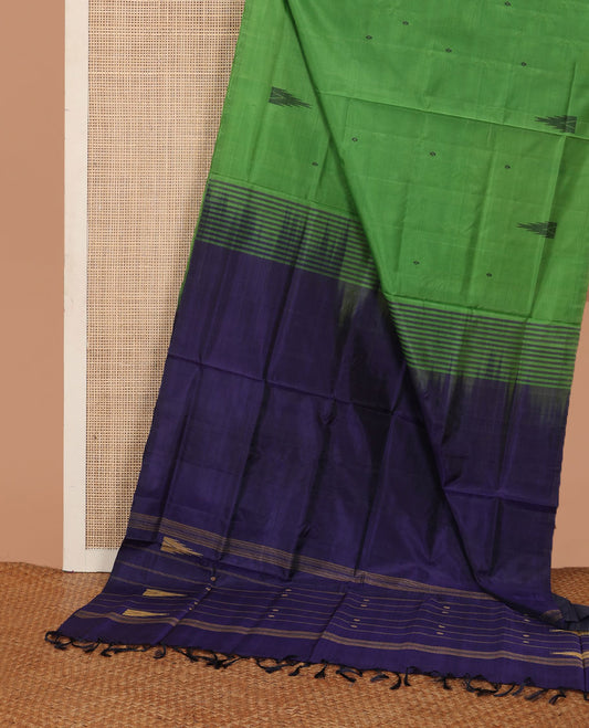 Borderless green buttas banana pith saree, contrast pallu of stripes, and temple buttas
