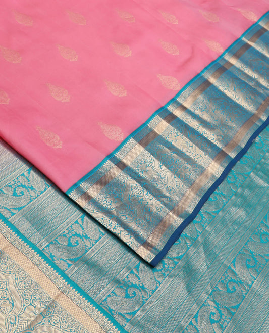 Pink zari buttas silk saree, contrast border of rekku,muthu,dhavana kodi,kuyil kann,mayil & iru thalai pakshi & pallu of traditional designs