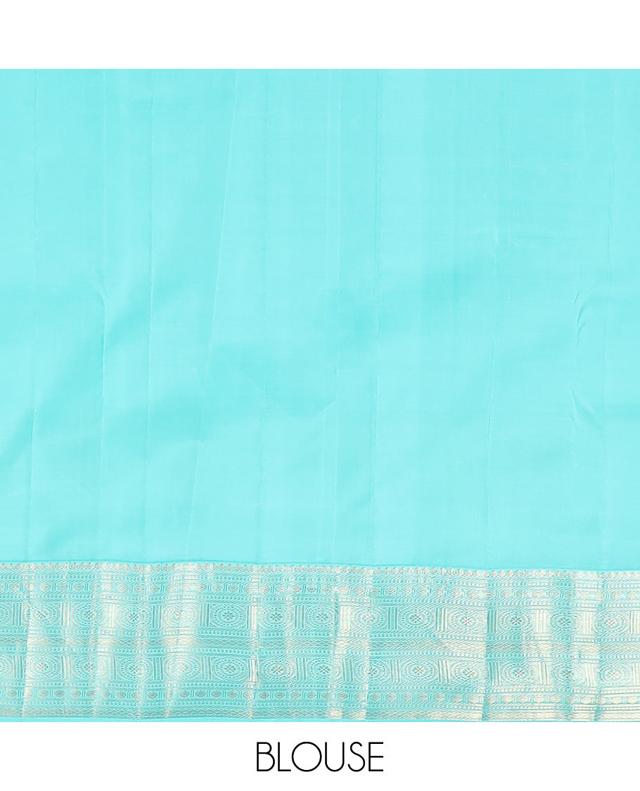 Yellow zari buttas silk saree, contrast border of thilakam mokku, poun, yaanai, chakram, and mayil kann designs, and jaal pallu