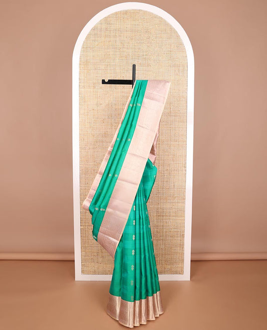 Green floral buttas silk saree with contrast border of rekku, muthu, mayil design & zari design pallu