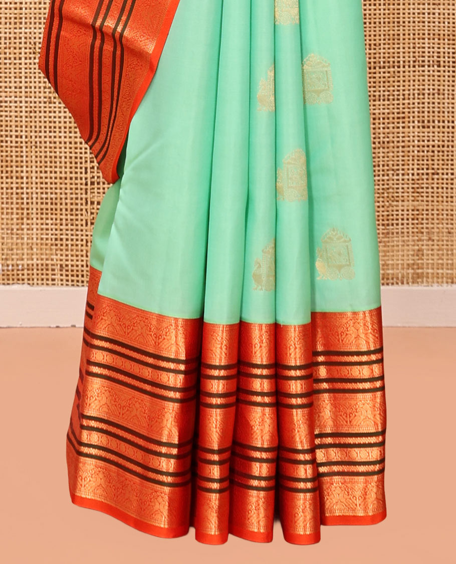 Turquoise Vasundhara Silk Saree, Finely Crafted with Zari Buttas, Complemented by a Contrast Border of Mayil, Neli, and Rudraksham Designs, Grand Pallu, and a Contrast Blouse
