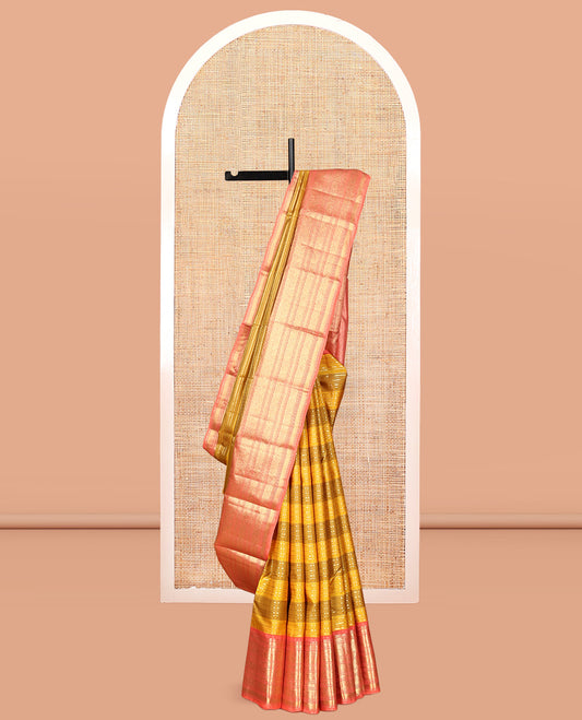 Yellow Striped Vasundhara Silk Saree, Complemented by a Contrast Border of Rekku, Kathir, Kodi Visiry, Mayil, and Yaanai Designs, Grand Pallu, and Contrast Blouse
