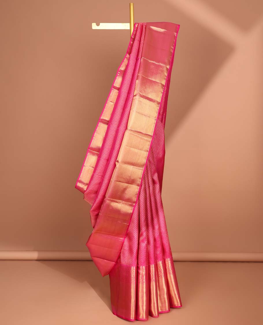 Pink checked design kancheepuram silk saree with self zari design border & floral zari design pallu