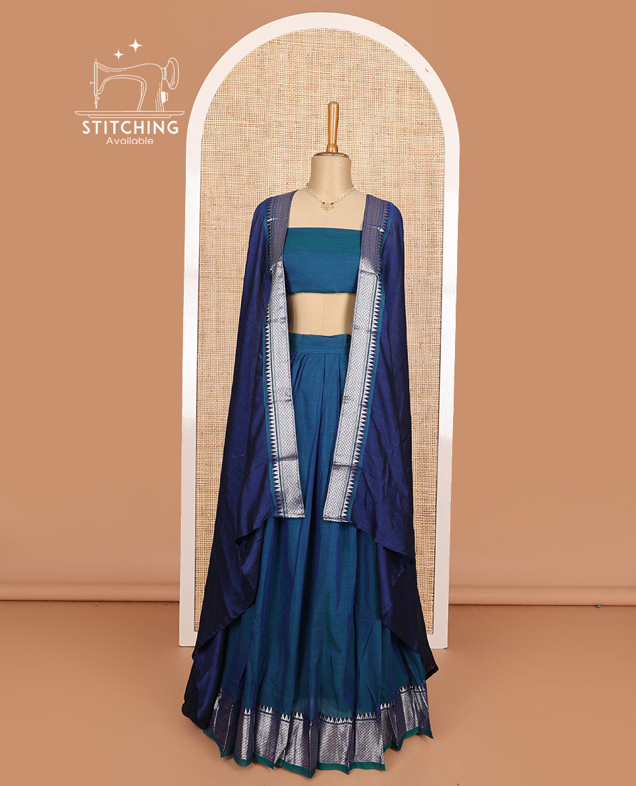 Blue cotton half-saree, plain with contrast traditional zari bordered skirt, matching blouse, and contrast zari border dhavani