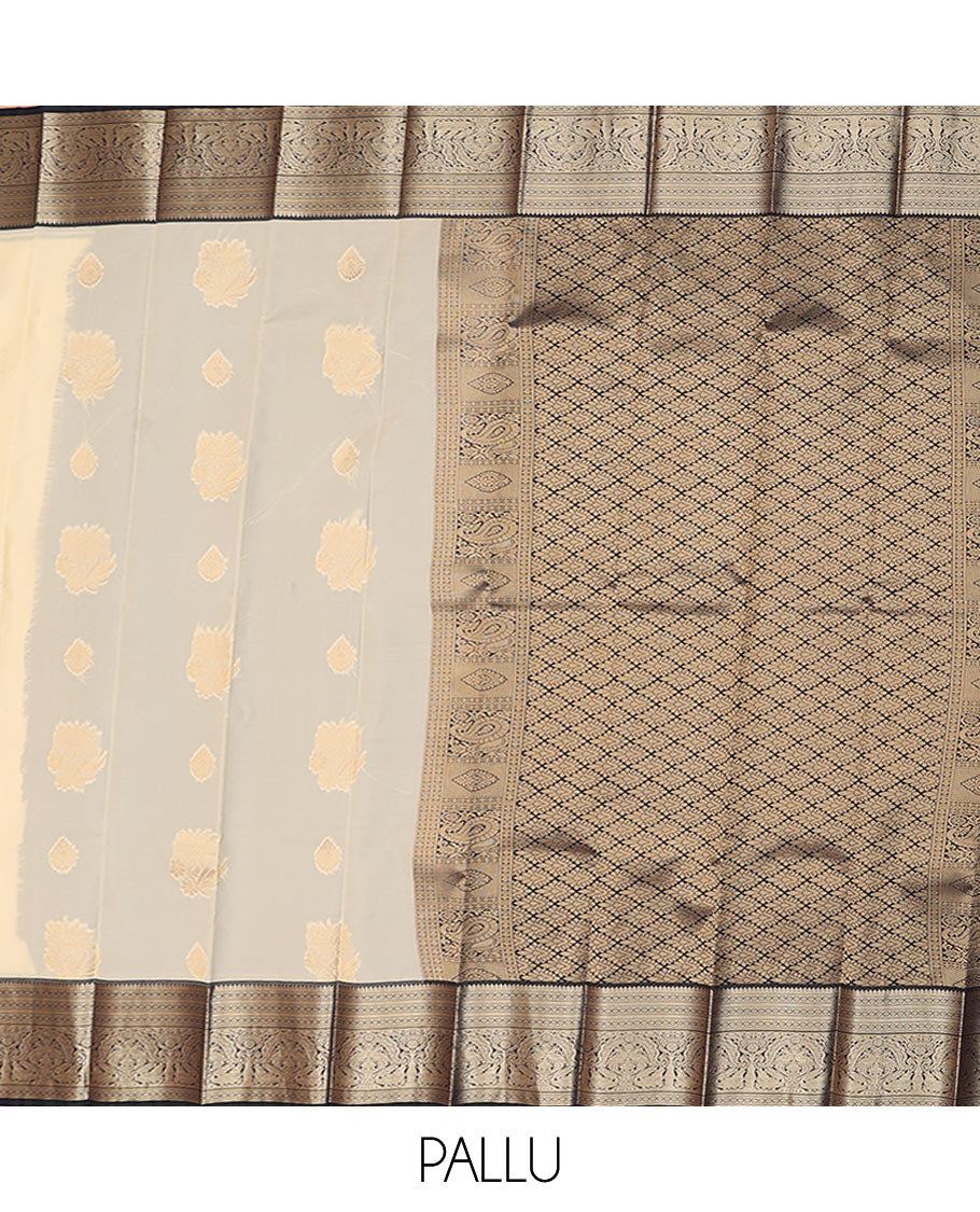 Cream butta enclosed checked budget silk saree, contrast traditional zari border, and intricate pallu