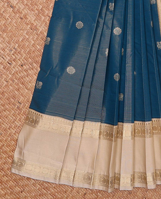 Peacock zari buttas and striped gift saree, contrast traditional zari rettai pettu design border, and intricate pallu