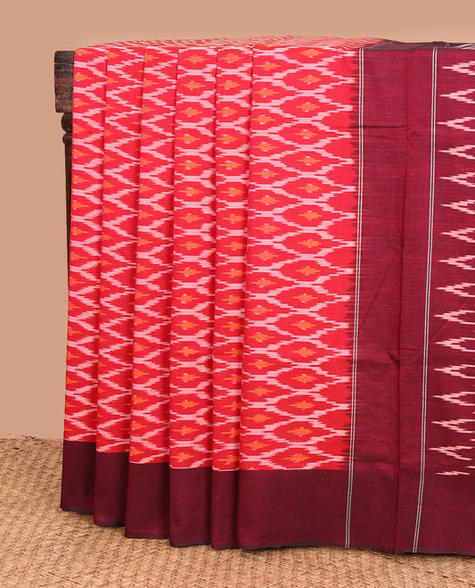 Red ogee patterned ikkat cotton saree, contrast plain border, and pallu of triangle buttas