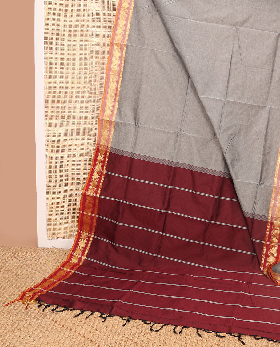 light grey poly cotton saree with contrast temple border & striped pallu