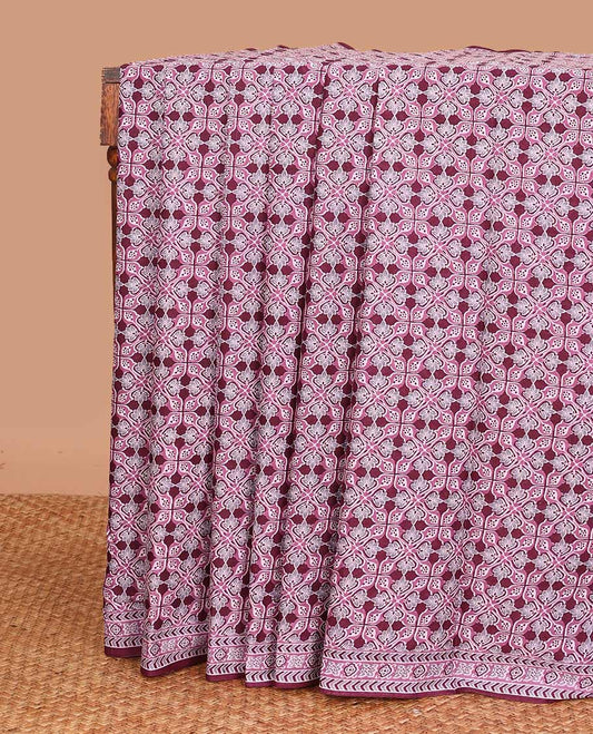 Purple intricately printed mul mul cotton saree, geometric printed border, and pallu