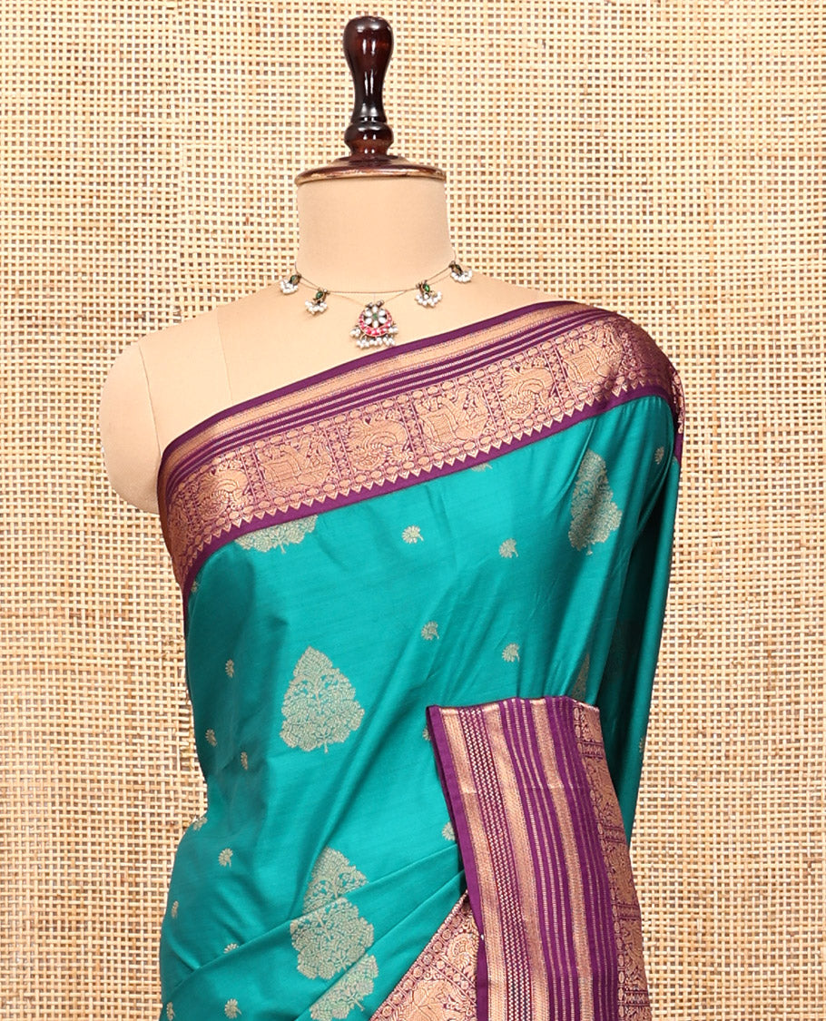 Sapphire Green-Purple Budget Silk Saree, Adorned with Zari Buttas, Complemented by a Contrast Peacock and Elephant Border, Jaal Pallu, and a Contrast Blouse