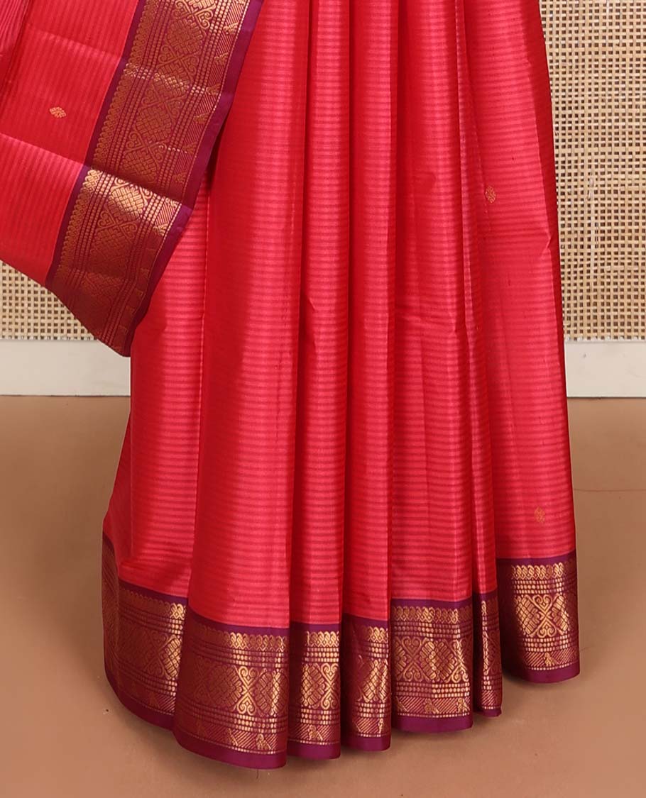 Pink striped and buttas Kanchipuram silk saree, contrast border of thilakam mokku, muthu, jadai nagam, and kili motifs and traditional zari design pallu