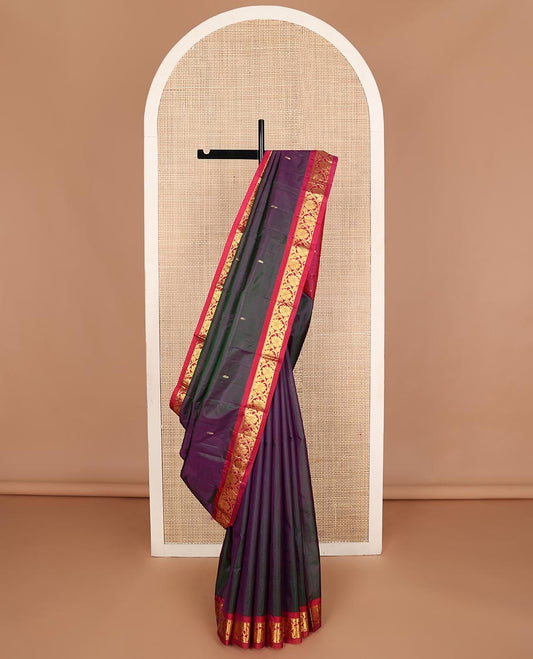 Purple dual-tone Kanchipuram silk saree, contrast border of thilakam mokku,banaras, and kodi visiry, and zari design pallu