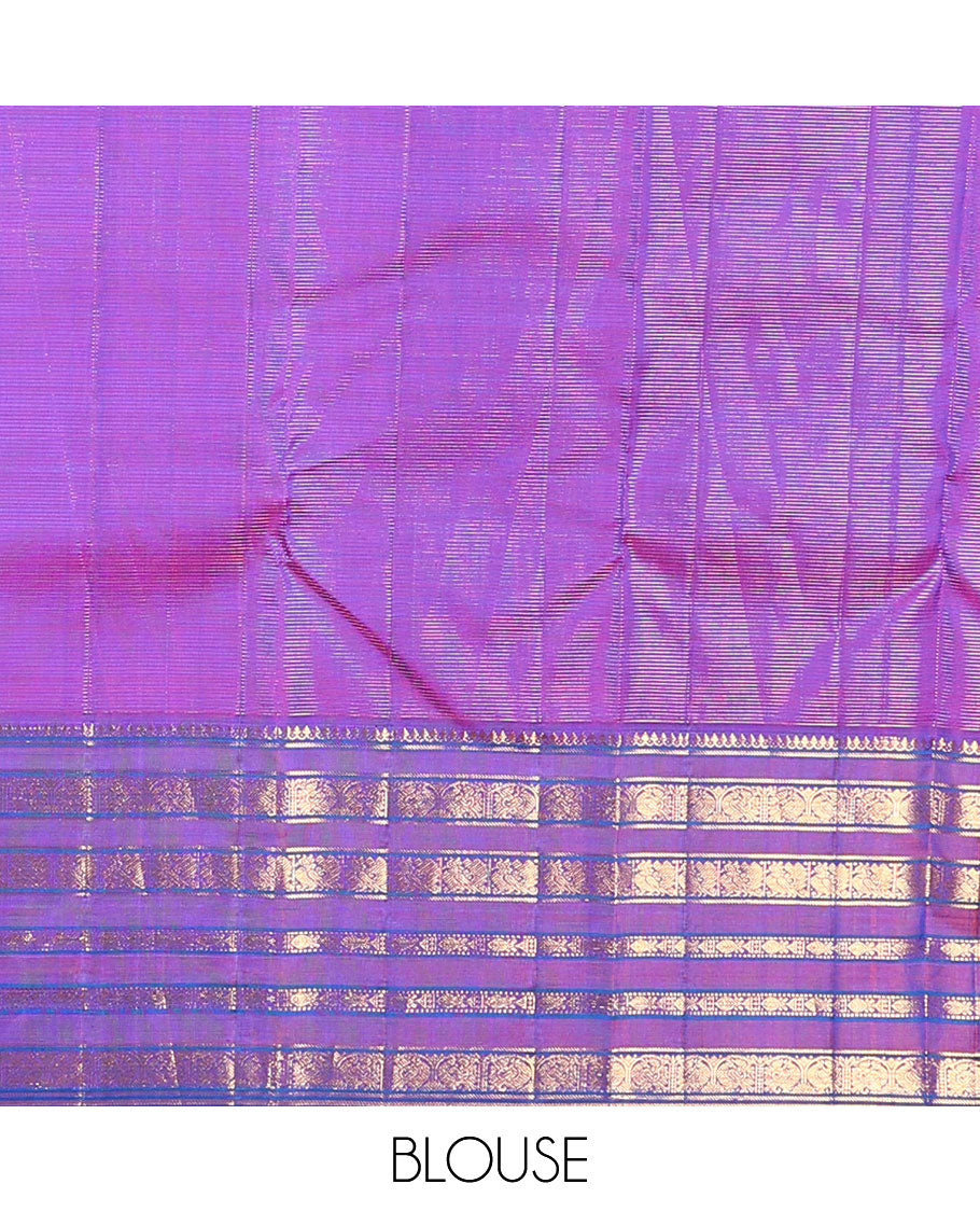 Blue striped and mayil buttas Kanchipuram silk saree, contrast border of thilakam mokku, mayil, and meen designs and annam chakram butta enclosed checked pallu