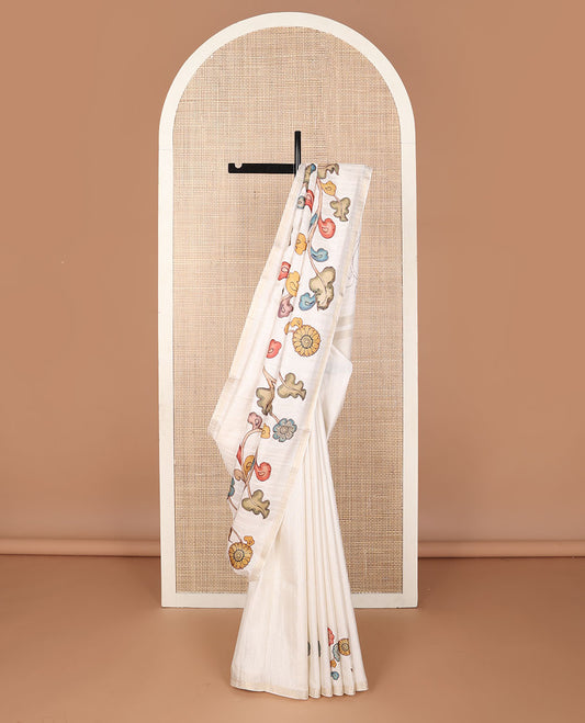 Cream colorful kalamkari-style floral vine printed tussar saree, zari border & pallu of zari stripes