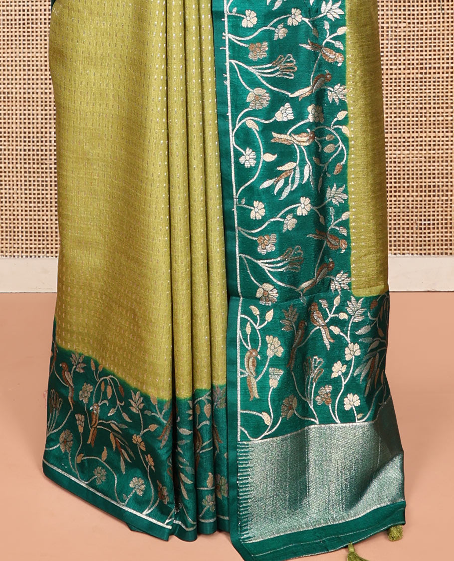 Green Matka Silk Saree, Finely Crafted with Buttas on Its Body, Complemented by Contrast Floral Vine and Bird Design Border, Pallu of Floral Vine and Bird Design, and Paired with a Contrast Blouse