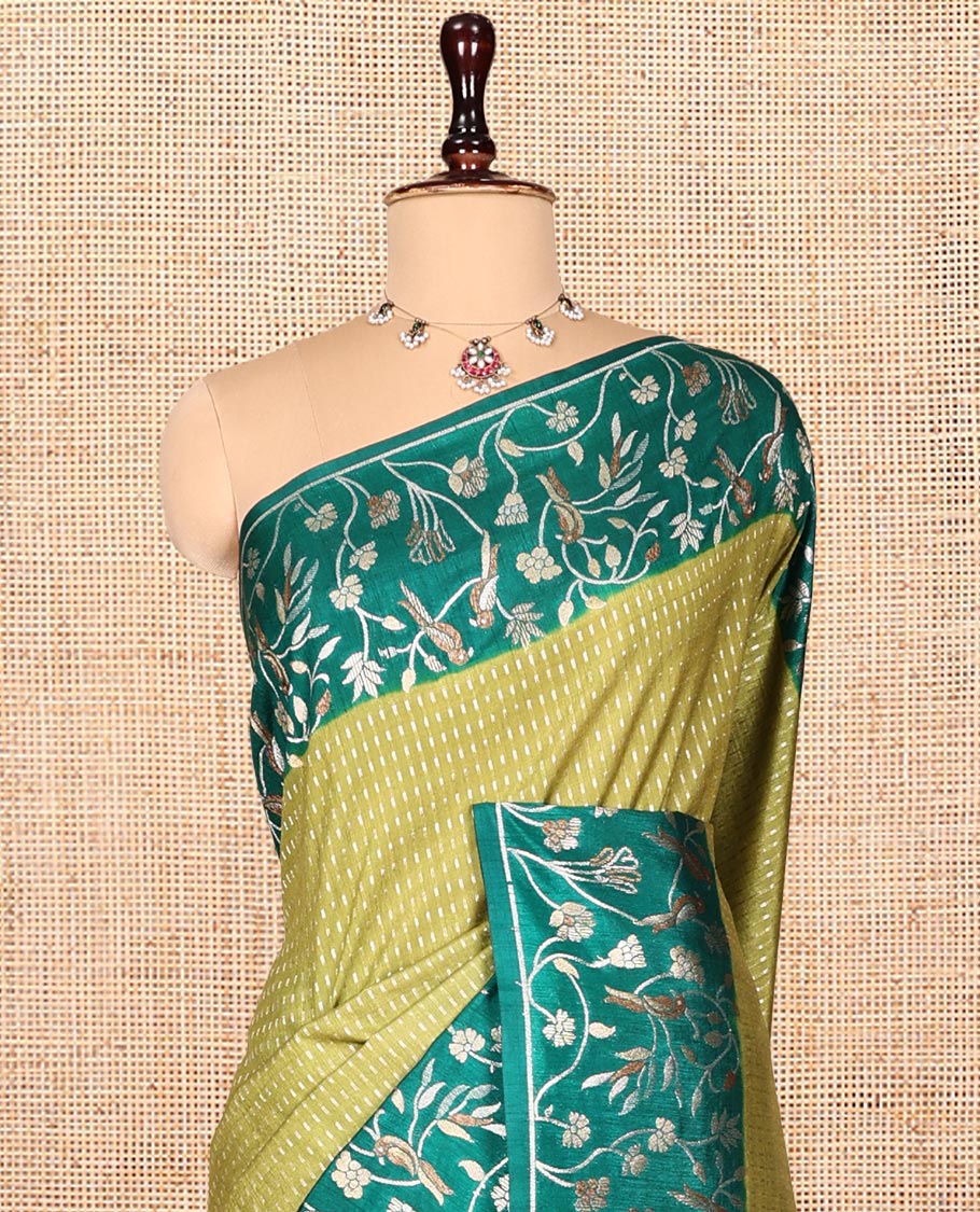 Green Matka Silk Saree, Finely Crafted with Buttas on Its Body, Complemented by Contrast Floral Vine and Bird Design Border, Pallu of Floral Vine and Bird Design, and Paired with a Contrast Blouse