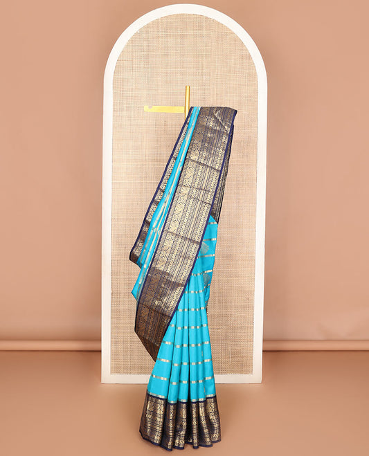Blue thick zari striped Vasundhara silk mix saree, contrast border of rekku,mayil,neli,kathir & cross kamalam & intricate pallu