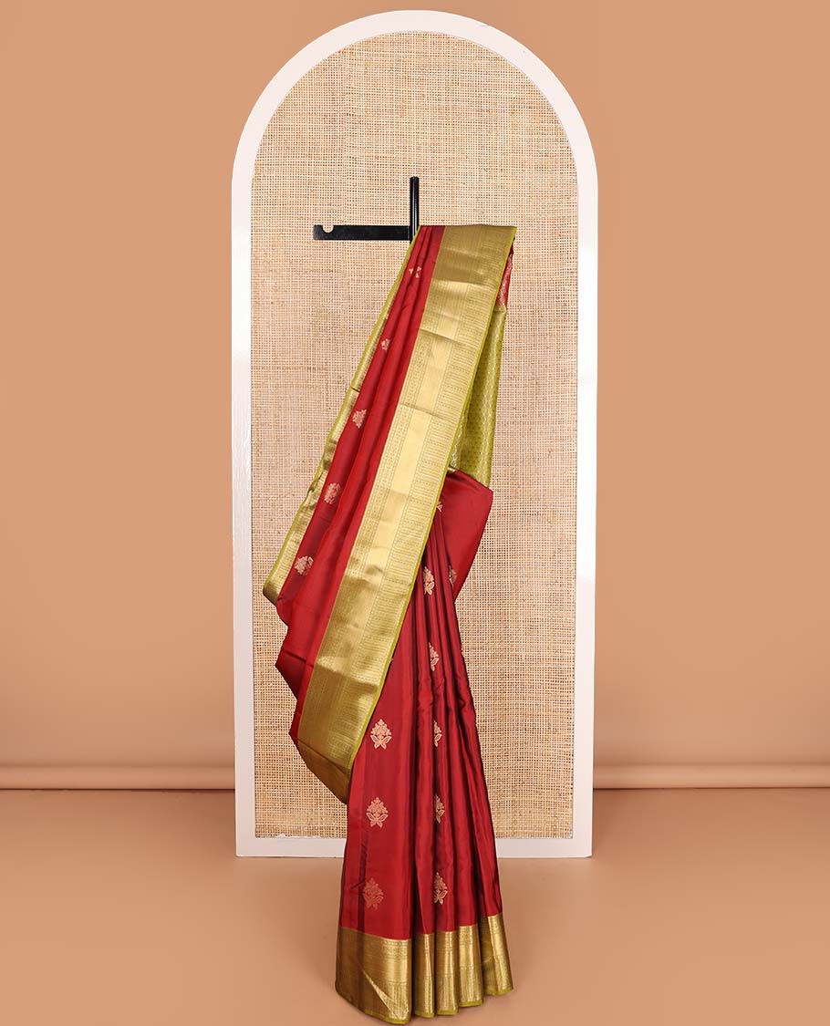 Red zari buttas Vasundhara silk mix saree, contrast border of rekku, poun, mayil kann,  neli, and manga designs, and intricate pallu