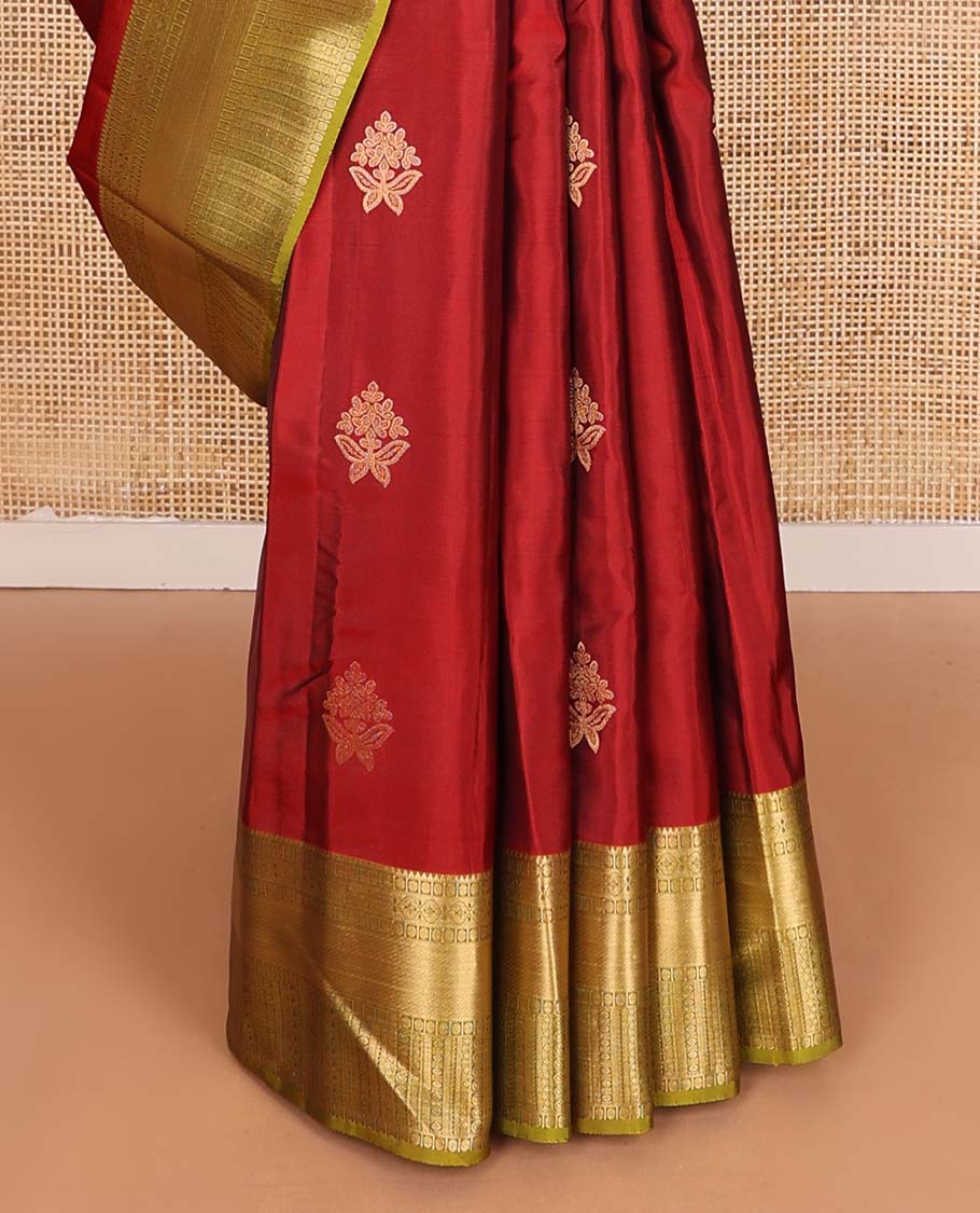 Red zari buttas Vasundhara silk mix saree, contrast border of rekku, poun, mayil kann,  neli, and manga designs, and intricate pallu