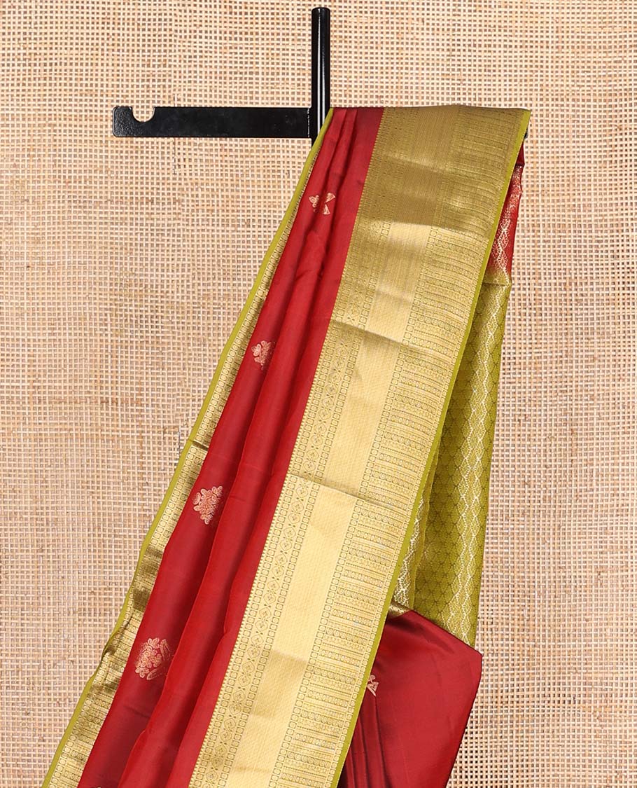Red zari buttas Vasundhara silk mix saree, contrast border of rekku, poun, mayil kann,  neli, and manga designs, and intricate pallu