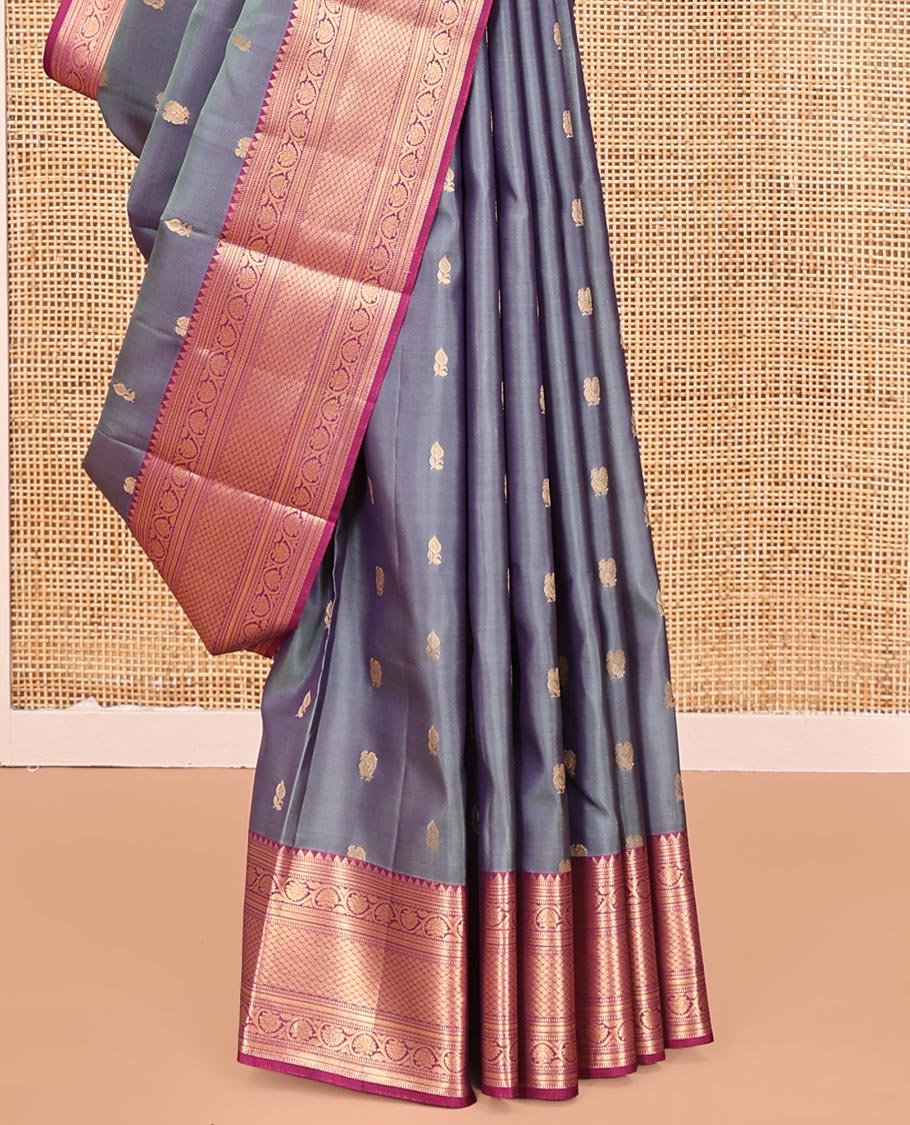 Grey Vasundhara Lite Silk Mix Saree, Beautifully Bedecked with Zari Buttas All Over Its Body, Complemented by Contrast Border of Rekku, Muthu, Kodi Visiry, and Jaal Designs, Grand Pallu and Paired with a Contrast Blouse