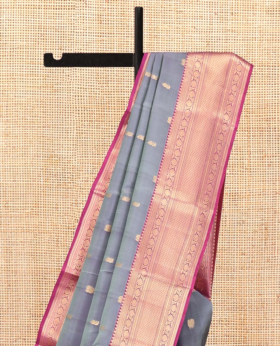 Grey Vasundhara Lite Silk Mix Saree, Beautifully Bedecked with Zari Buttas All Over Its Body, Complemented by Contrast Border of Rekku, Muthu, Kodi Visiry, and Jaal Designs, Grand Pallu and Paired with a Contrast Blouse