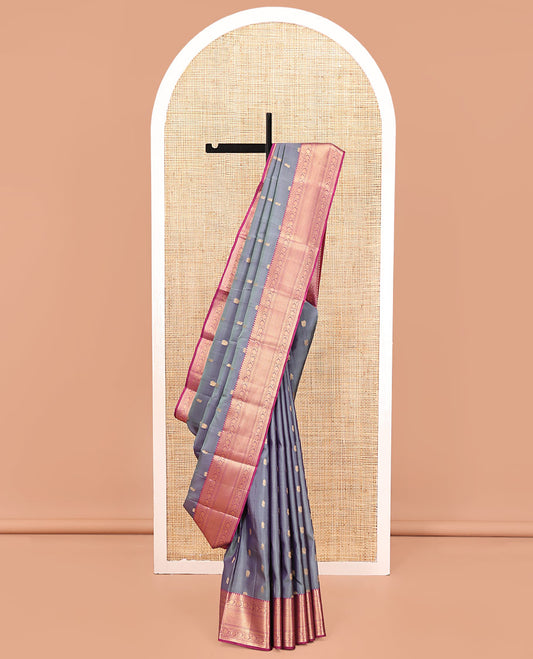 Grey Vasundhara Lite Silk Mix Saree, Beautifully Bedecked with Zari Buttas All Over Its Body, Complemented by Contrast Border of Rekku, Muthu, Kodi Visiry, and Jaal Designs, Grand Pallu and Paired with a Contrast Blouse