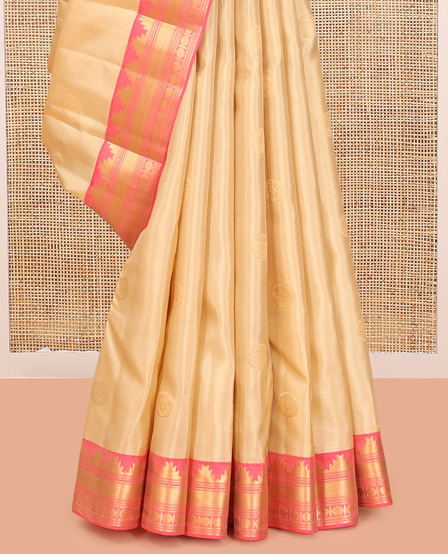 Sandal Vasundhara Lite Silk Mix Saree, Sparsely Sparkled with Chakram Buttas, a Contrast Border of Thazampoo Rekku, Neli, Mayil Kann, and Rudhraksham, Grand Pallu, and a Contrast Blouse