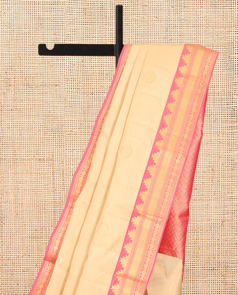 Sandal Vasundhara Lite Silk Mix Saree, Sparsely Sparkled with Chakram Buttas, a Contrast Border of Thazampoo Rekku, Neli, Mayil Kann, and Rudhraksham, Grand Pallu, and a Contrast Blouse