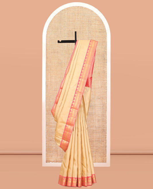 Sandal Vasundhara Lite Silk Mix Saree, Sparsely Sparkled with Chakram Buttas, a Contrast Border of Thazampoo Rekku, Neli, Mayil Kann, and Rudhraksham, Grand Pallu, and a Contrast Blouse