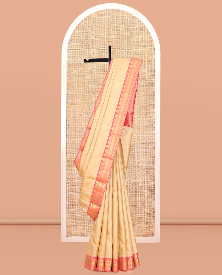 Sandal Vasundhara Lite Silk Mix Saree, Sparsely Sparkled with Chakram Buttas, a Contrast Border of Thazampoo Rekku, Neli, Mayil Kann, and Rudhraksham, Grand Pallu, and a Contrast Blouse