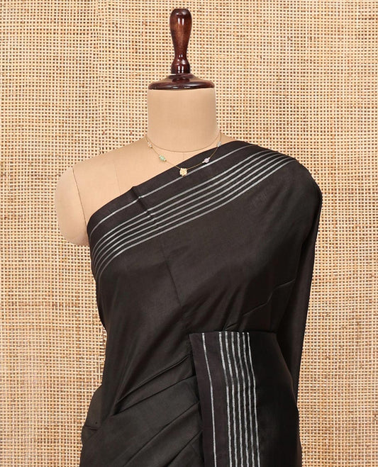 Black Plain Banana Pith Saree, Subtle Striped Border, Pallu Steeped with Stripes, and Paired with a Matching Blouse