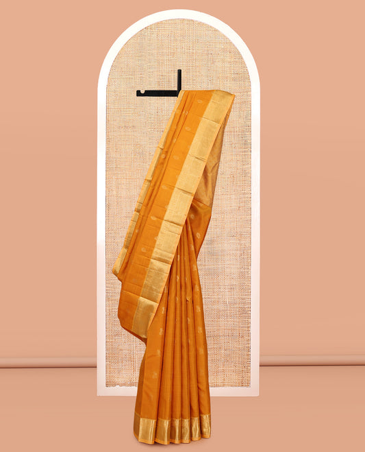 Yellow Vasundhara Silk Saree, Woven with Zari Buttas, a Contrast Border of Rekku, Muthu, Mayil, and Kuyil Kann Designs, Grand Jaal Pallu, and a Contrast Blouse