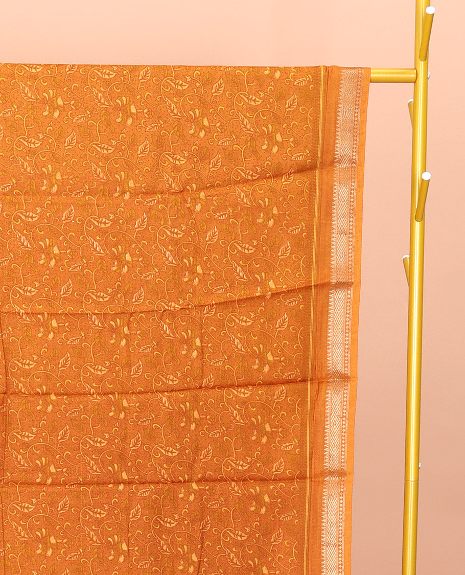 Orange Mul Mul Cotton Saree, Detailed with Leaf Print, a Subtle Traditional Border, a Floral-Printed Pallu, and a Matching Blouse