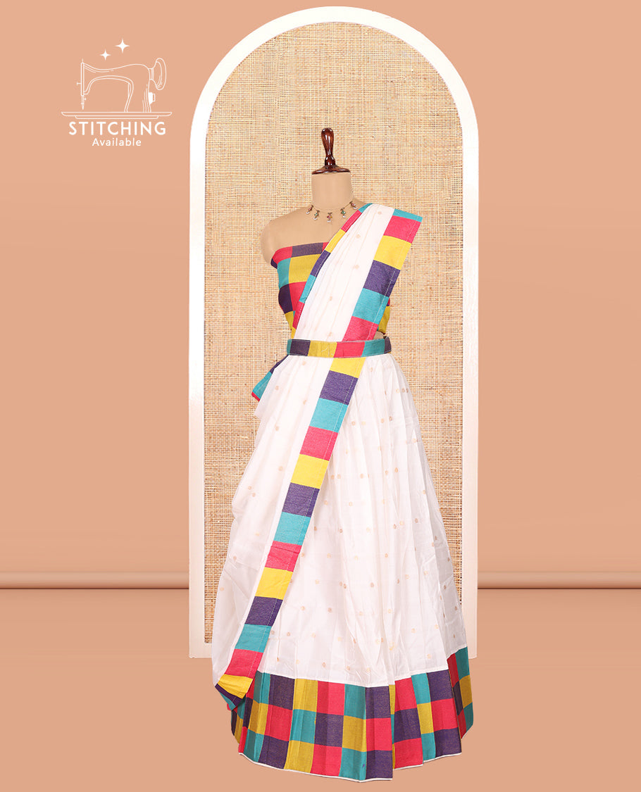 Cream Banarasi Silk Half-Saree Features Buttas Skirt, Contrast Madras Checked Blouse, and a Matching Semi-Silk Dhavani