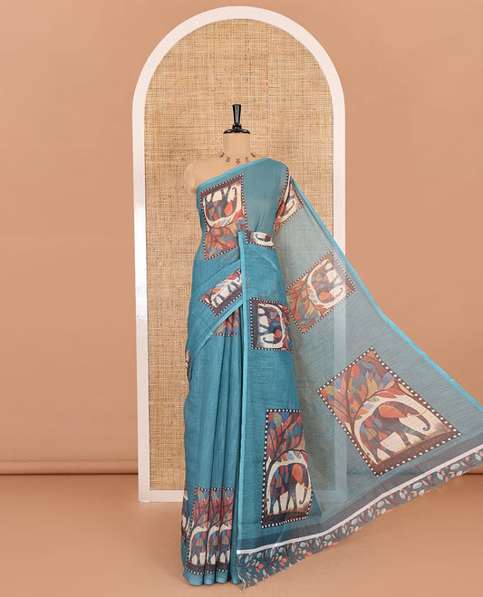 Blue plain linen cotton saree, mordern art style elephant motifs printed border, elephant printed pallu, and a leaf printed blouse
