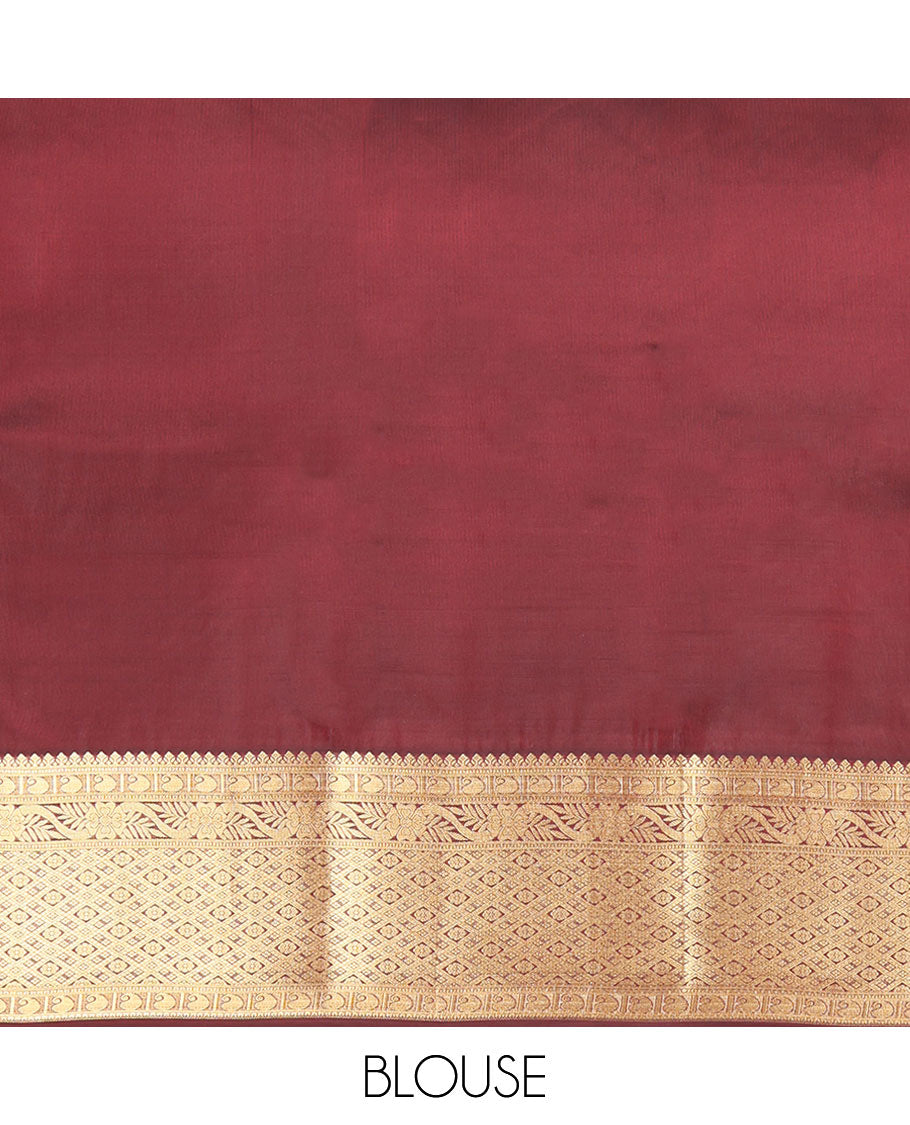 Red Vasundhara Lite Silk Mix Saree, Beautified with Zari Buttas on Its Body, Complemented by a Contrast Border of Manga, Kodi Visiry, and Jaal Designs, Mughal-Style Intricately Designed Pallu, and Paired with a Contrast Blouse