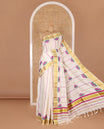 Cream-purple striped and Pichwai lotus motifs printed Kerala cotton saree, gold zari striped border, and a matching blouse