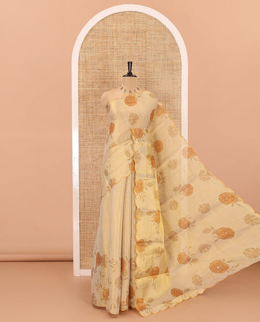 Gold and yellow rose motifs printed with mirror work tissue saree, scallop embroidered border, printed pallu, and a contrast blouse