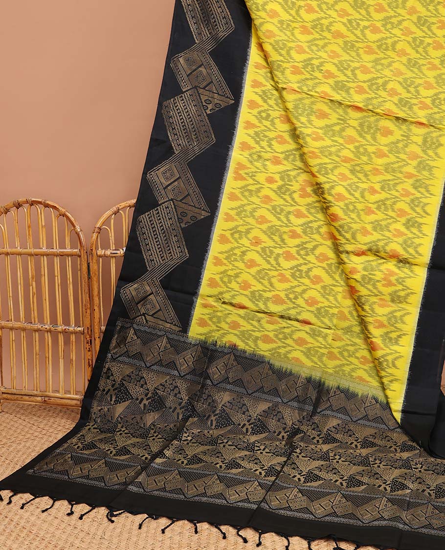 Yellow ikkat style floral vine design soft silk saree with contrast zari border & geometric zari design pallu
