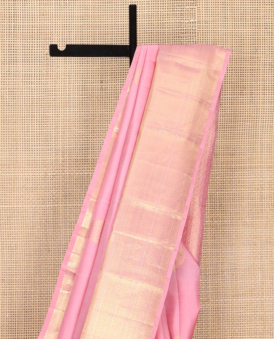 Pink Kanchipuram Silk Saree, Enthralled with Zari Buttas All Over Its Body, Highlighted by a Zari Border of Traditional Designs, Grand Jaal Pallu, and Paired with a Matching Blouse