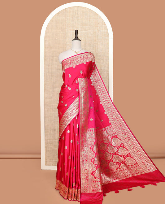 Pink Art Vastrakala Silk Saree Elegantly Framed with Zari Buttas with Stone Work All Over Its Body, Adorned with Traditional Design Border, Majestically Detailed Pallu of Zari and Stone Work, and Paired with a Matching Blouse