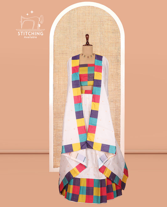 Cream Banarasi Silk Half-Saree Features Buttas Skirt, Contrast Madras Checked Blouse, and a Matching Semi-Silk Dhavani
