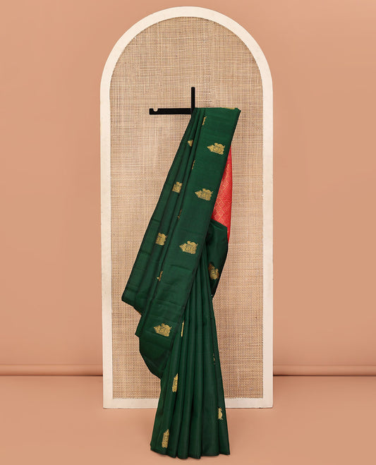 Borderless Green Kanchipuram Silk Saree, Bedecked with Mayil Buttas All Over Its Body, Complemented by a Contrast Pallu of Intricate Designs, and Paired with a Contrast Blouse